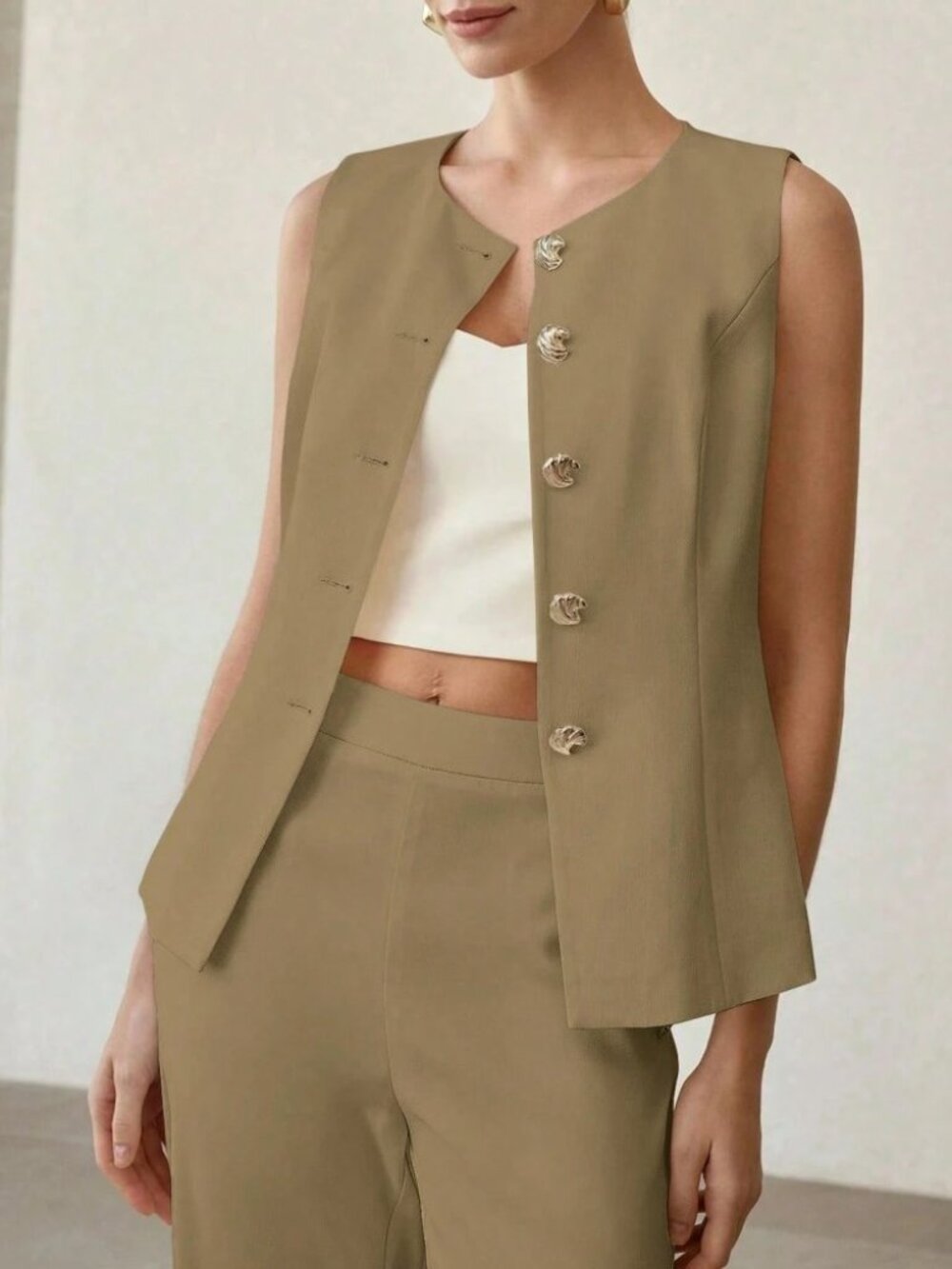 Tan Sleeveless Vest with Sculpted Gold Buttons